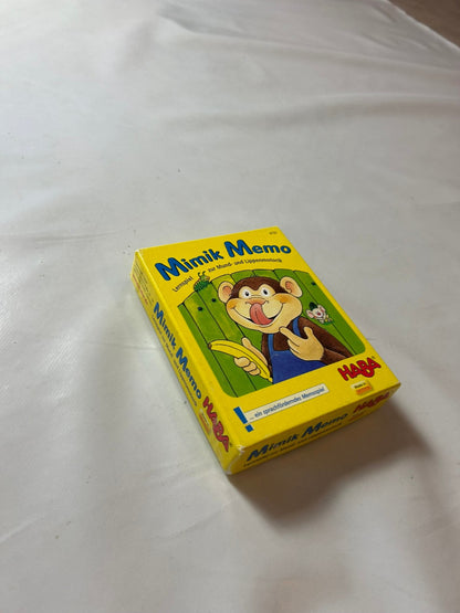 7754392